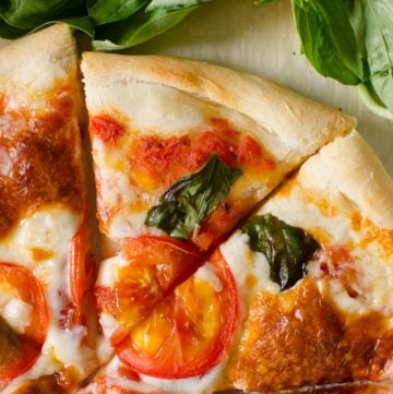 Nothing beats the simplicity of fresh tomato, basil and cheesy mozzarella that makes up this stunning Pizza Margherita!