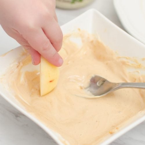 Peanut Butter Yogurt Apple Dip is Kid Cook friendly and good for a growing body too! Made from plain yogurt and powdered peanut butter, this dip is sure to make apples disappear fast!