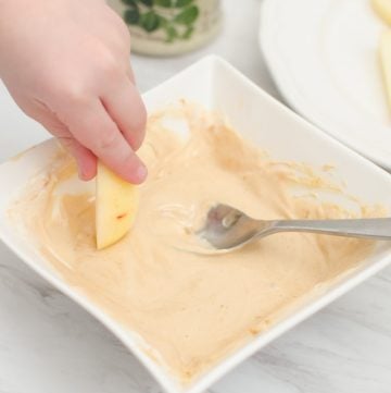 Peanut Butter Yogurt Apple Dip is Kid Cook friendly and good for a growing body too! Made from plain yogurt and powdered peanut butter, this dip is sure to make apples disappear fast!