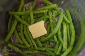 Garlic Parmesan Green Beans are the perfect side to any dish, the garlic and crisp parmesan crumbles take these green beans to the next level.