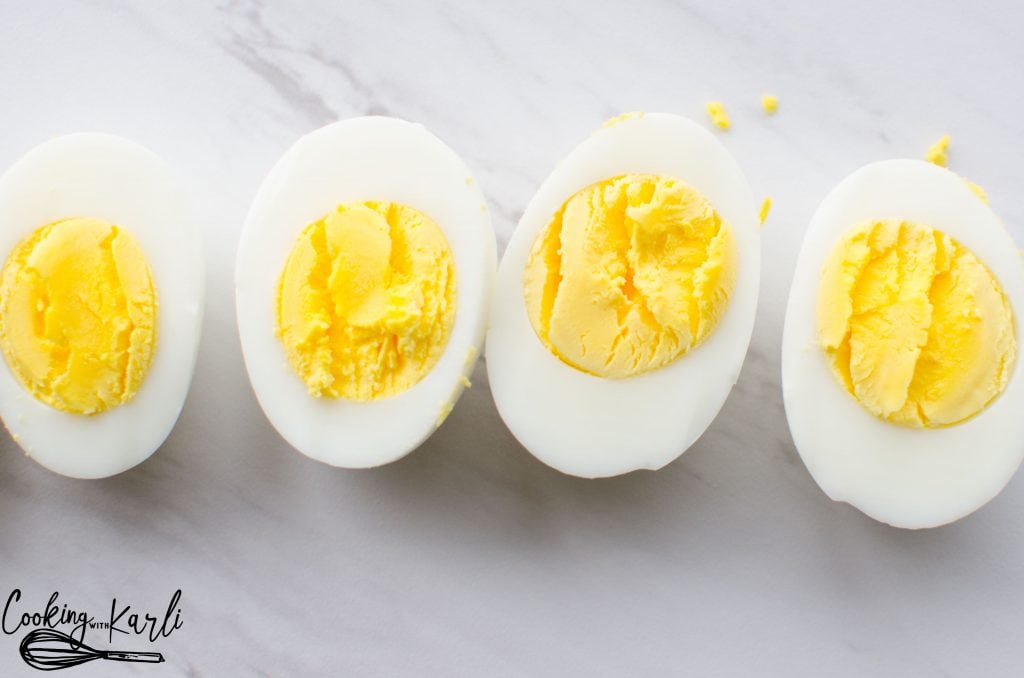 Instant Pot Hard Boiled Eggs- you'll never make them any other way again! It's as easy as 5-5-5. Five minutes High pressure, five minute Natural Pressure Release (NPR), five minute ice bath for perfect eggs that peel like a dream!