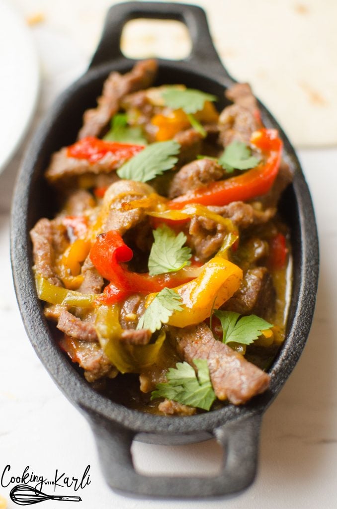Instant Pot Steak Fajitas are done in less than 15 minutes! The steak strips, peppers and onions explode with flavor! This is an easy meal for a busy week night.