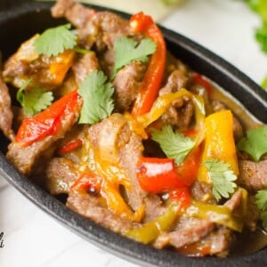 Instant Pot Steak Fajitas are done in less than 15 minutes! The steak strips, peppers and onions explode with flavor! This is an easy meal for a busy week night.