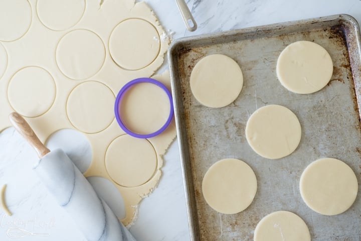 sugar cookies being cut out