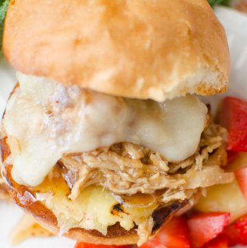 Pulled Teriyaki Chicken Sliders are full of the sweet and tangy flavors from the made from scratch teriyaki sauce; paired with grilled pineapple, melty cheese and a toasted bun this fun meal is a guaranteed winner.
