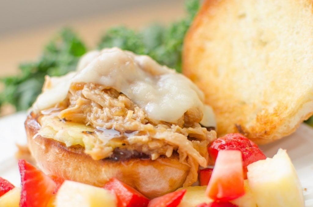 Pulled Teriyaki Chicken Sliders are full of the sweet and tangy flavors from the made from scratch teriyaki sauce; paired with grilled pineapple, melty cheese and a toasted bun this fun meal is a guaranteed winner.