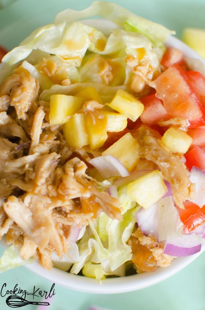 Teriyaki Chicken Chopped Salad consists of crunchy lettuce, warm teriyaki chicken, fresh pineapple and an array of optional toppings. The salad is finished off with a drizzle of homemade teriyaki dressing. 