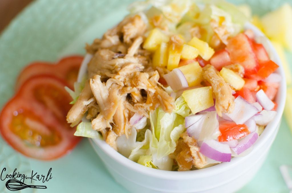Teriyaki Chicken Chopped Salad consists of crunchy lettuce, warm teriyaki chicken, fresh pineapple and an array of optional toppings. The salad is finished off with a drizzle of homemade teriyaki dressing. 