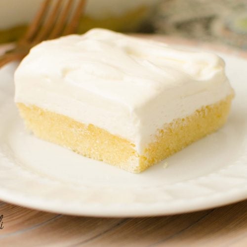 Vanilla lush cake is a served cold layered dessert.