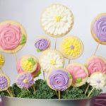 Tasty Mother's Day gift of sugar cookie flowers packaged in a planting pot.