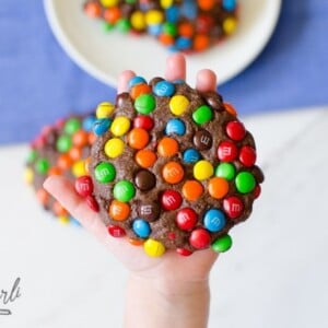 Chocolate cookie exploding with M&Ms.