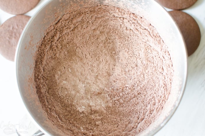 Powdered sugar and cocoa powder whisked together to make the chocolate buttercream frosting.