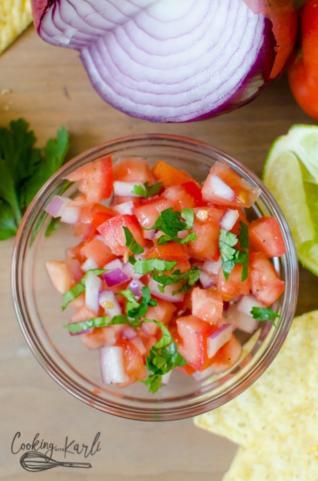 tomatos, onion, jalapeños, cilantro, and lime dice are mixed together to make this pico de Gallo.