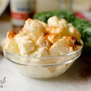 Creamy potato salad sprinkled with paprika