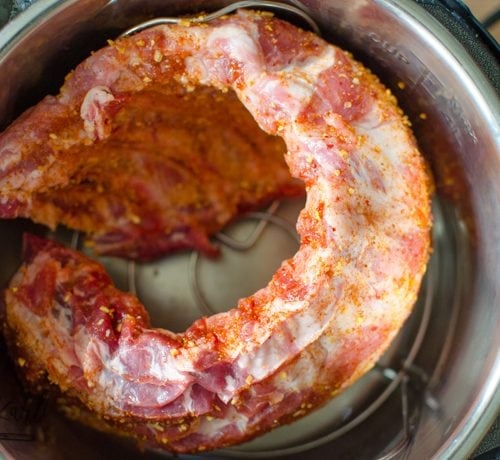 A rack of baby back ribs inside the Instant Pot.