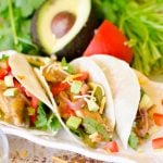 Instant Pot Chicken Fajitas are exploding with flavor, extremely fast and easy. The crispy bell peppers and onions paired with the perfectly cooked chicken slices wrapped in a warm tortilla make the fastest, tastiest week-night meal to date! |Cooking with Karli| #instantpot #chicken #fajitas #weeknight #meal #easy #fast #recipe
