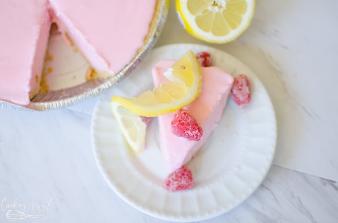 Frosted Raspberry Lemonade Pie sliced and served.
