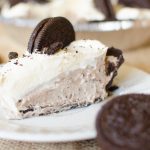 Oreo Pie is a No Bake Pie that embodies everything Cookies and Cream. From the classic speckled grey filling to the Oreo cookie crust. This pie will not disappoint!