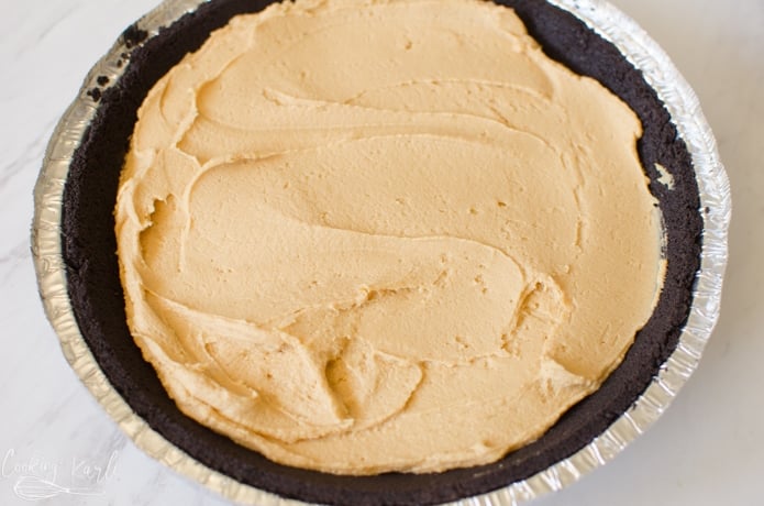 Beautiful peanut butter pie filling inside of an Oreo crust.