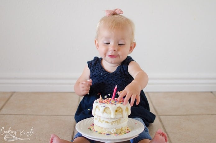 Baby eating the smash cake.