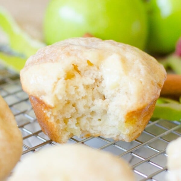 Apple Cinnamon Muffins are a soft and fluffy, made from scratch muffin. The basic batter is easy to make. The apple chunks and cinnamon swirl throughout the muffin make it the perfect Fall and Autumn breakfast snack or dessert. |Cooking with Karli| #fall #autumn #breakfast #apple #cinnamon #muffins #easy #fast #glaze #fromscratch #recipe #moist