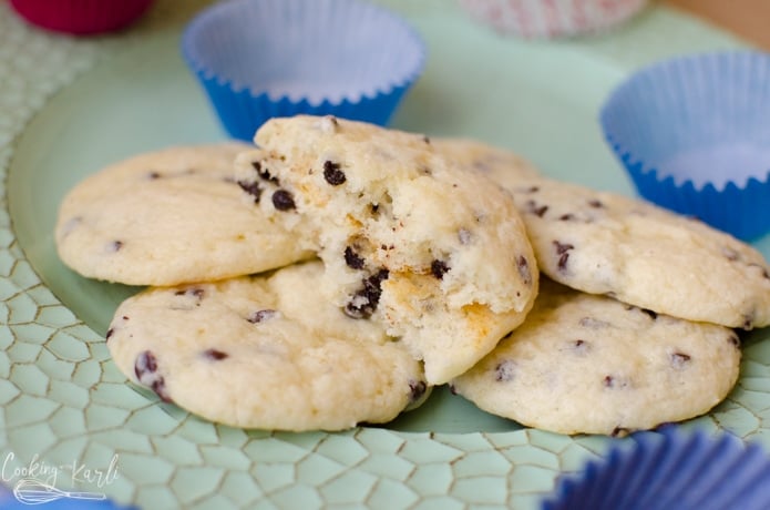 chocolate chip muffin tops are light and fluffy after baking.