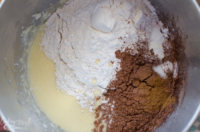 cinnamon is added to the chocolate zucchini cake batter.