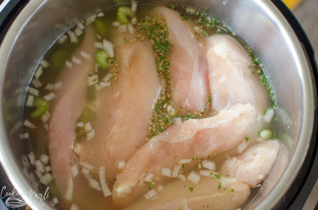 chicken in the broth before cooking.