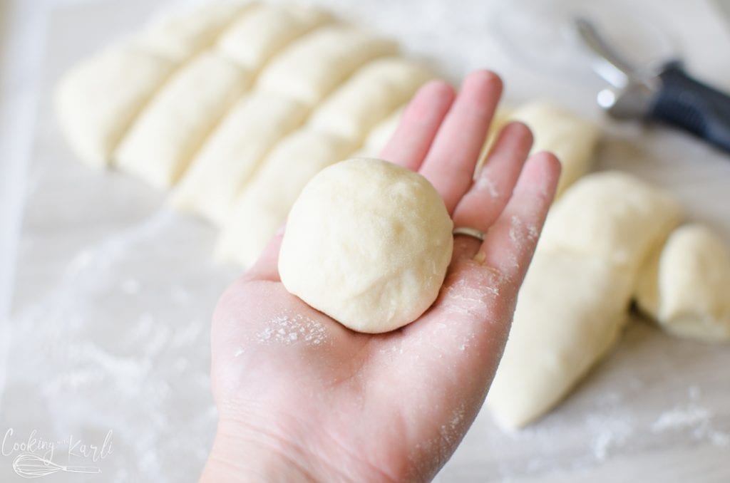 shaping the bread dough into rolls