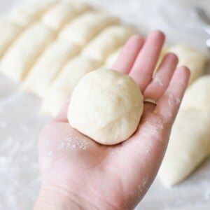 shaping the bread dough into rolls