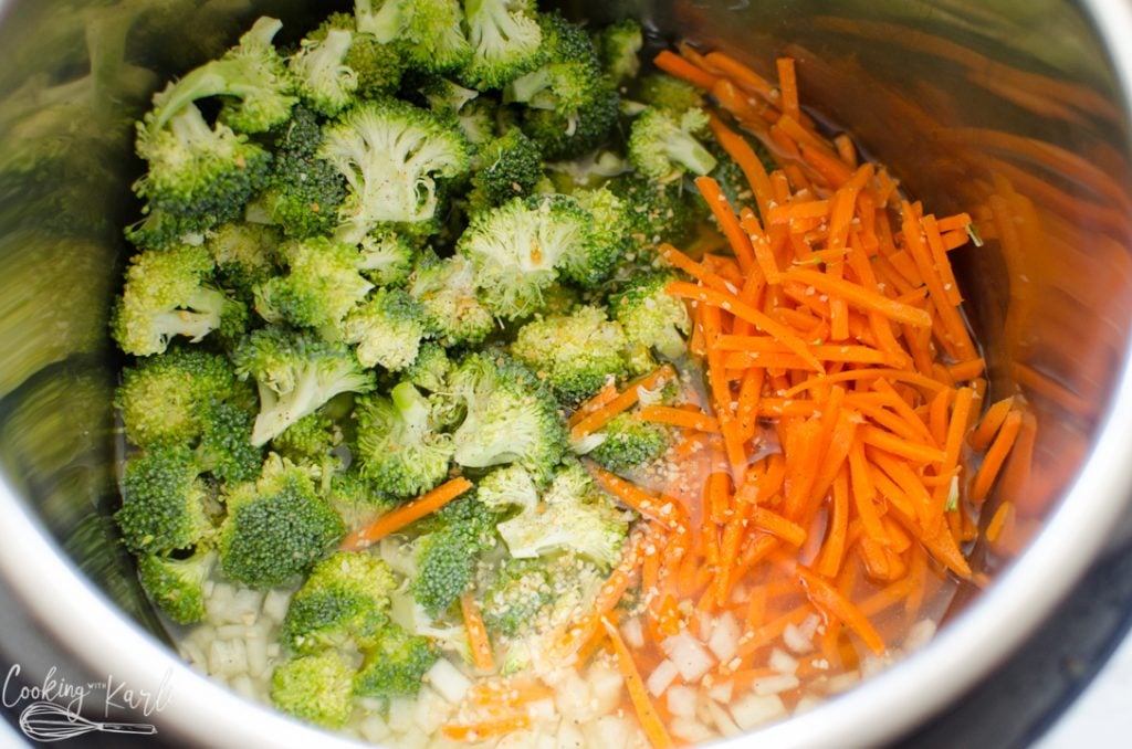 broccoli, carrots, broth and seasonings in the Instant Pot 
