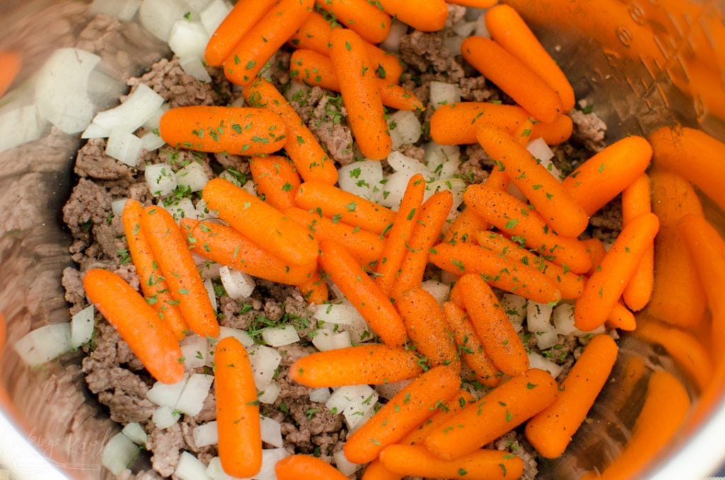 ground beef, carrots and onion in the Instant Pot 