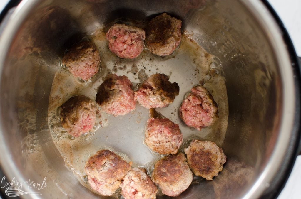 Salisbury steak meatballs browning in the Instant Pot 