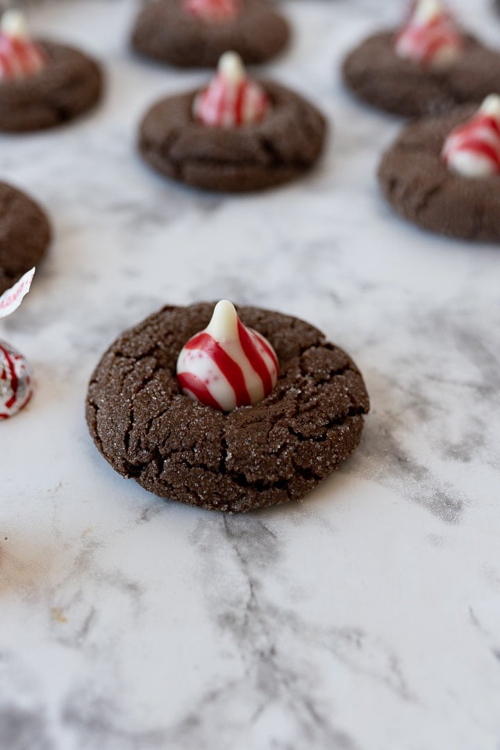chocolate peppermint kiss cookies on the counter. 