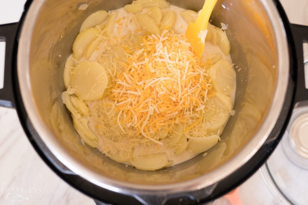 evaporated milk and cheese added to the au gratin potatoes