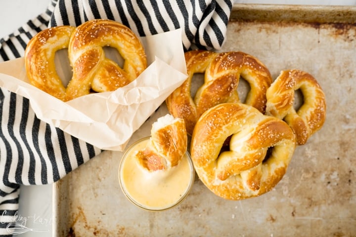 soft pretzels, finished and served with cheese sauce.