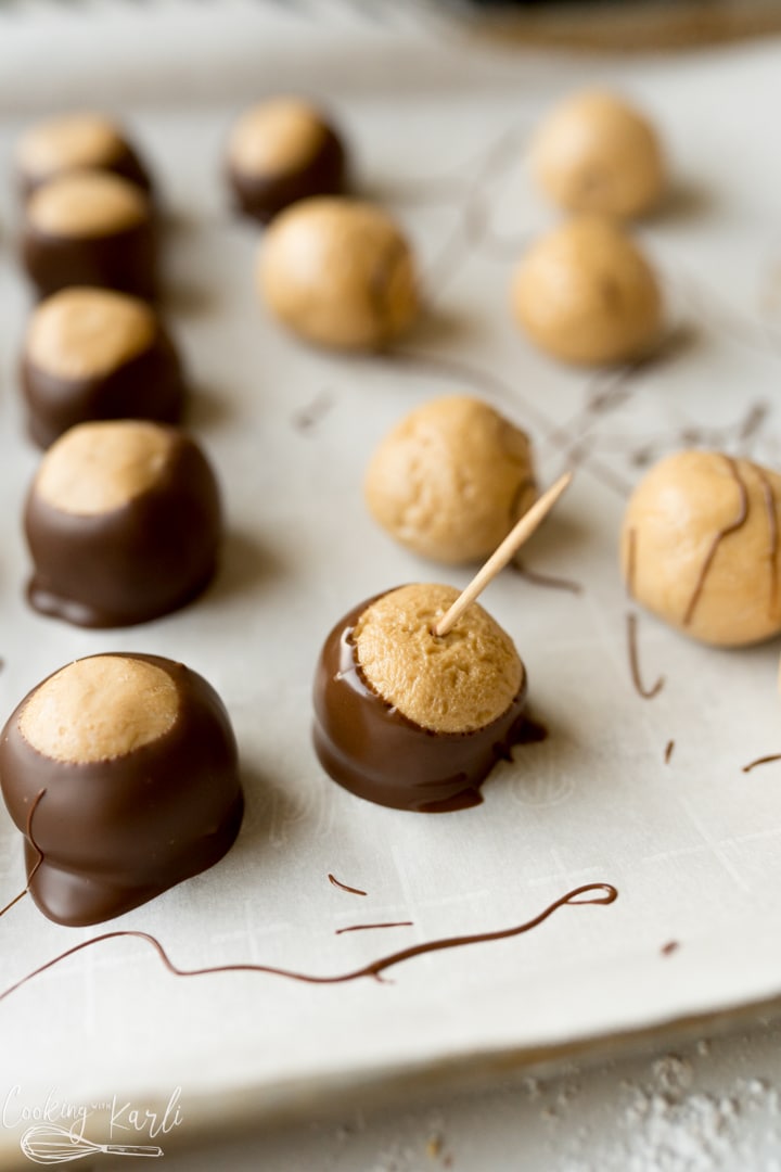 toothpick is used to dip the peanut butter balls in chocolate 