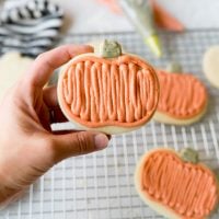 halloween sugar cookies in the shape of a pumpkin