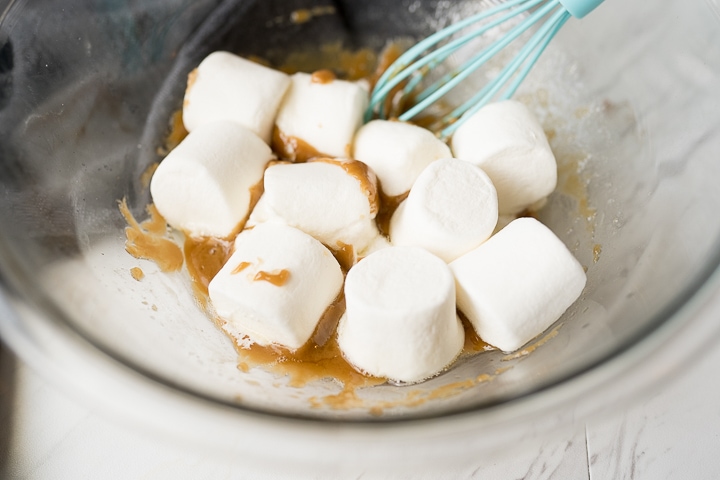 Marshmallows added to the caramel mixture for the popcorn balls