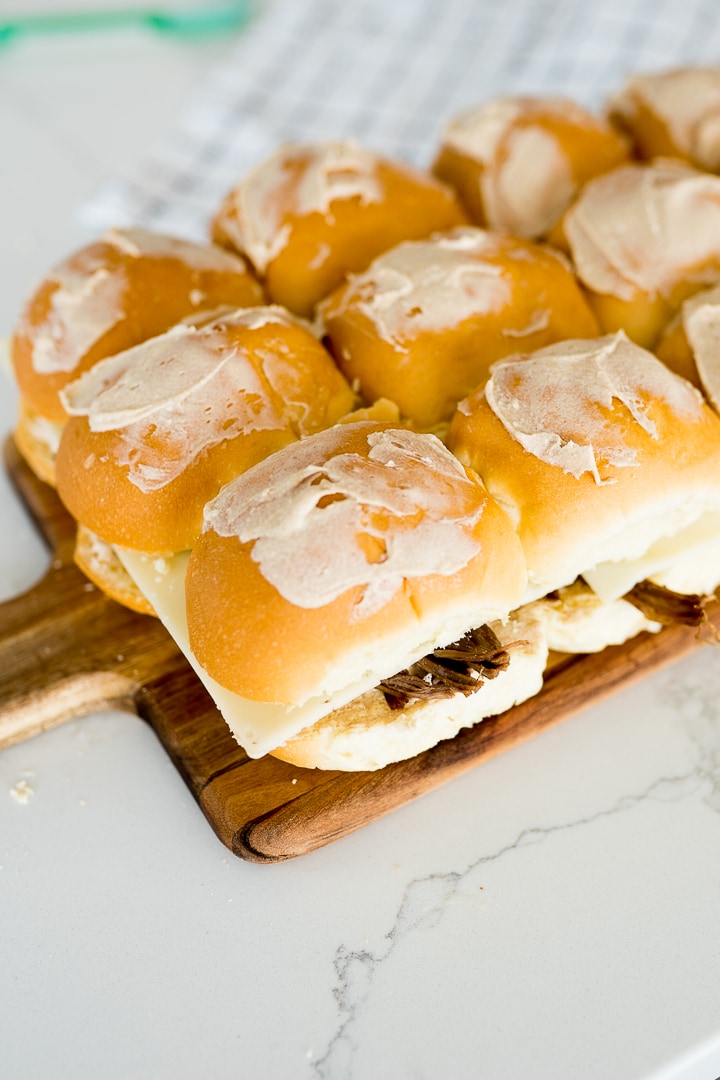 French dip sliders prior to baking in the oven