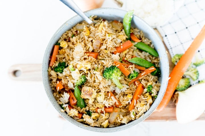fried rice with veggies in bowl