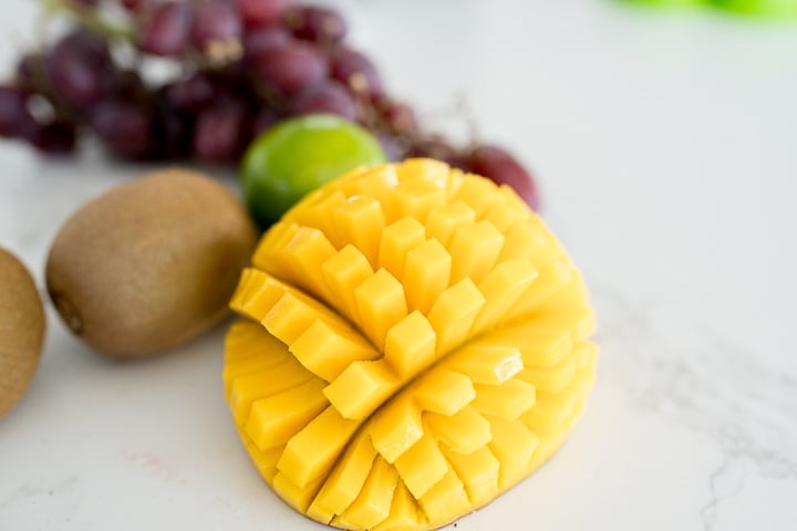 mango being cut