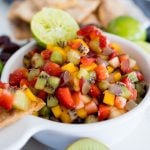 fruit salsa with cinnamon chips, served in a bowl