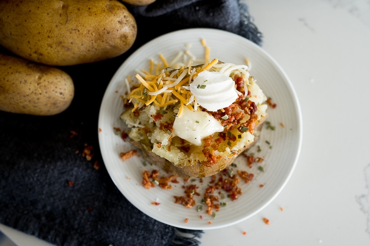 Loaded baked potato with bacon and chives