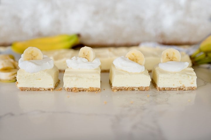 banana cream cheesecake, cut into squares