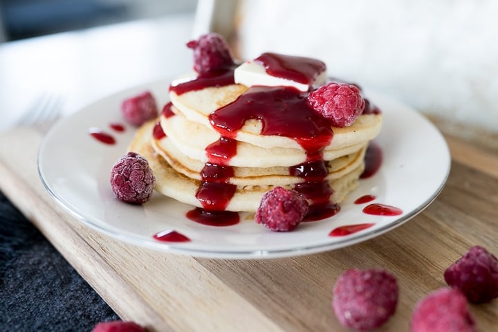 Raspberry syrup on pancakes