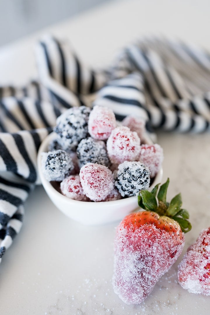 frosted or sugar coated strawberries, raspberries and blackberries