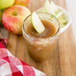 caramel sauce with an apple dipped in