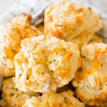 cheddar bay biscuits, in a large bowl being served
