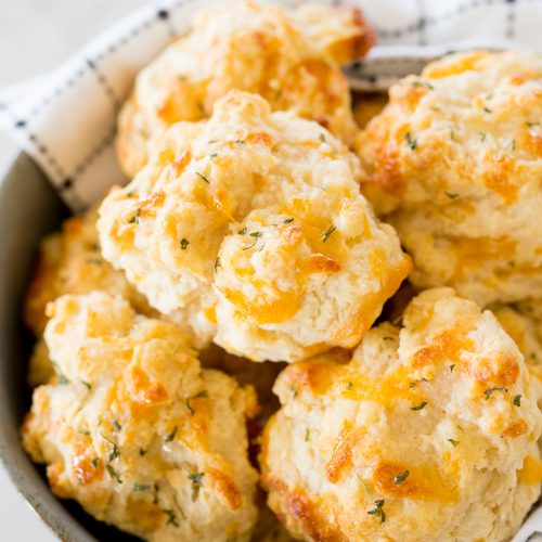 cheddar biscuits in a bowl for serving